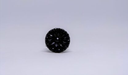 Bague pâte de verre noir à motif floral