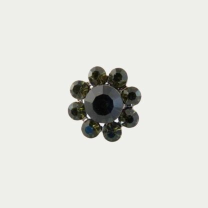 Bague strass verts. Motif floral.