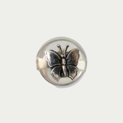 Bague transparente et papillon métal