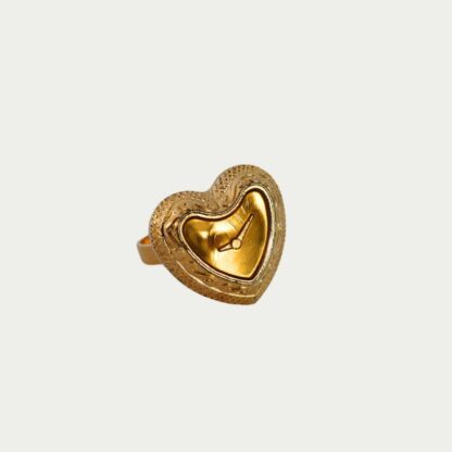 Bague dorée en forme de montre