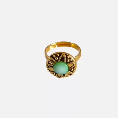 bague verte et dorée