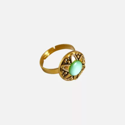bague verte et dorée