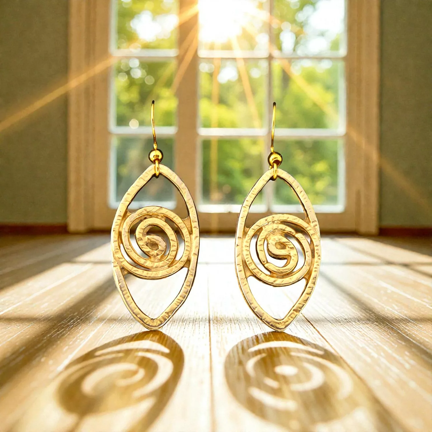 boucles d'oreilles pendantes dorées