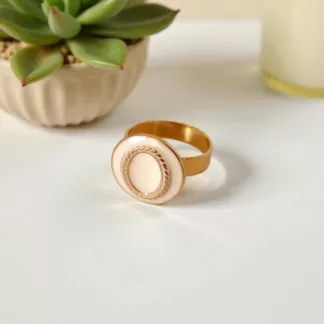 bague crème et dorée